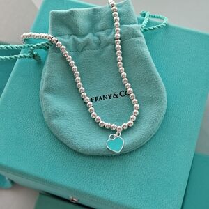 Tiffany & Co. Silver Bead Necklace with Blue Heart Pendant